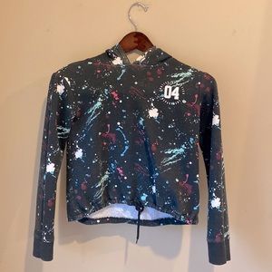Girls justice paint splatter pattern cropped hoodie.